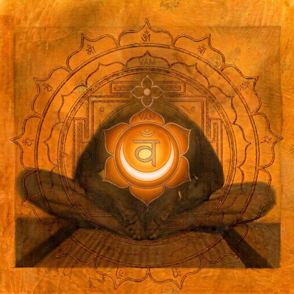 Sacral chakra artwork: the Svadhisthana symbol over a seated figure